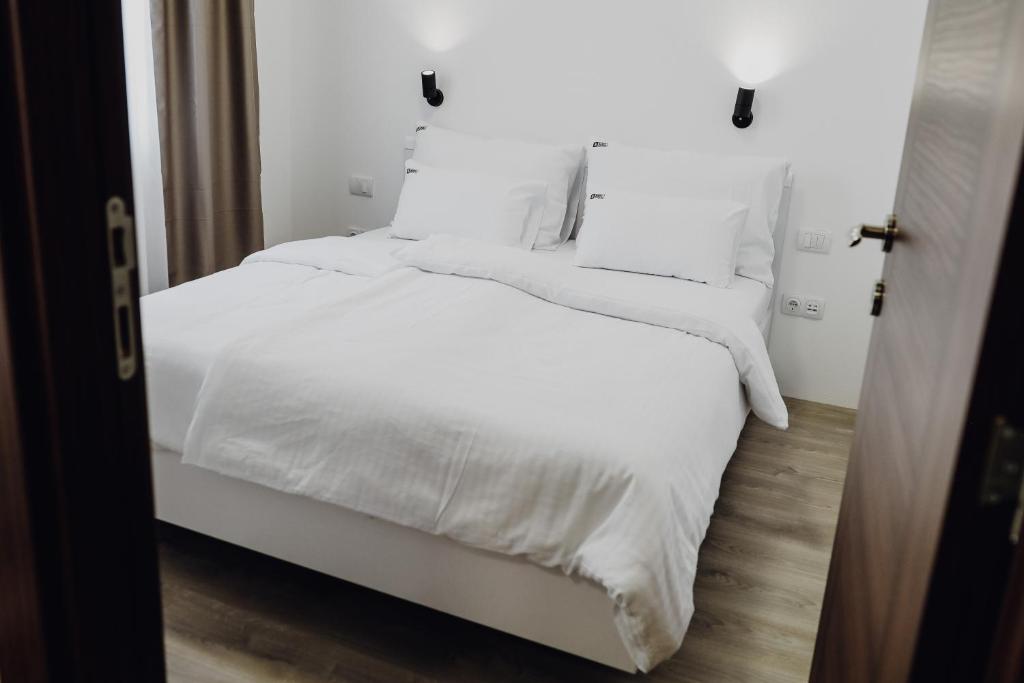 Postel nebo postele na pokoji v ubytování S Apart Rooms