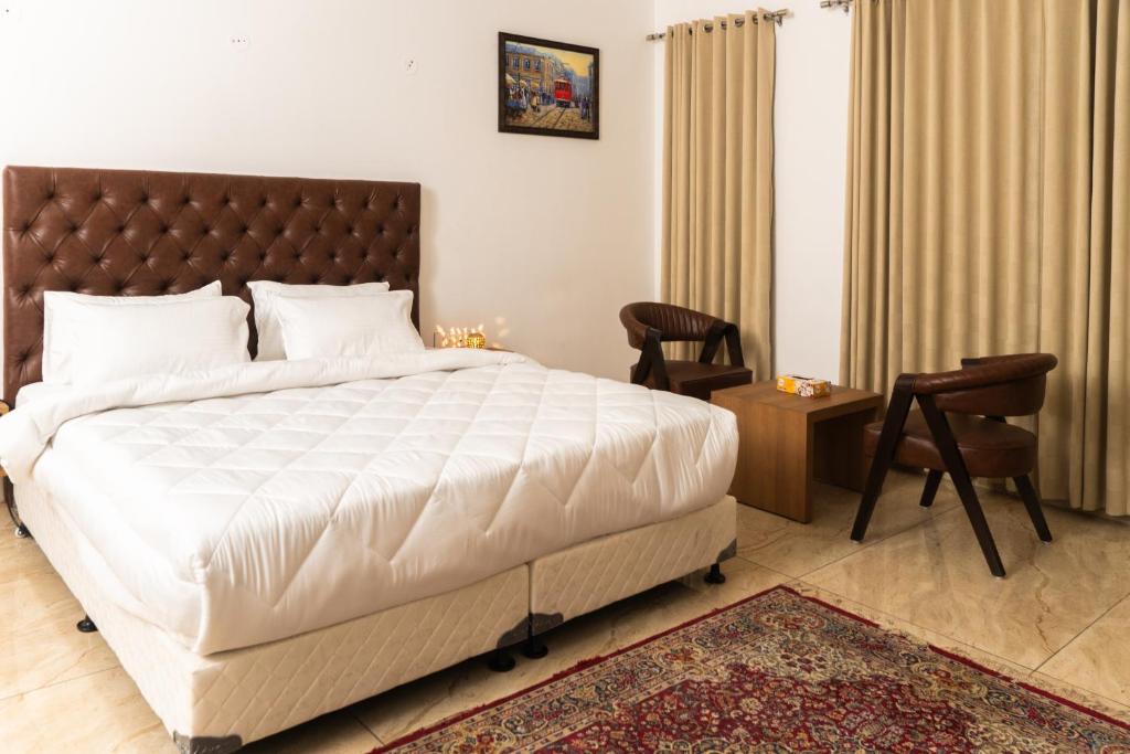 Postel nebo postele na pokoji v ubytování Sandane Homes