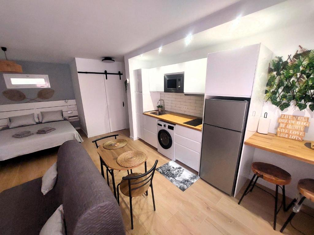 Kuchyň nebo kuchyňský kout v ubytování Apartamentos Sarah