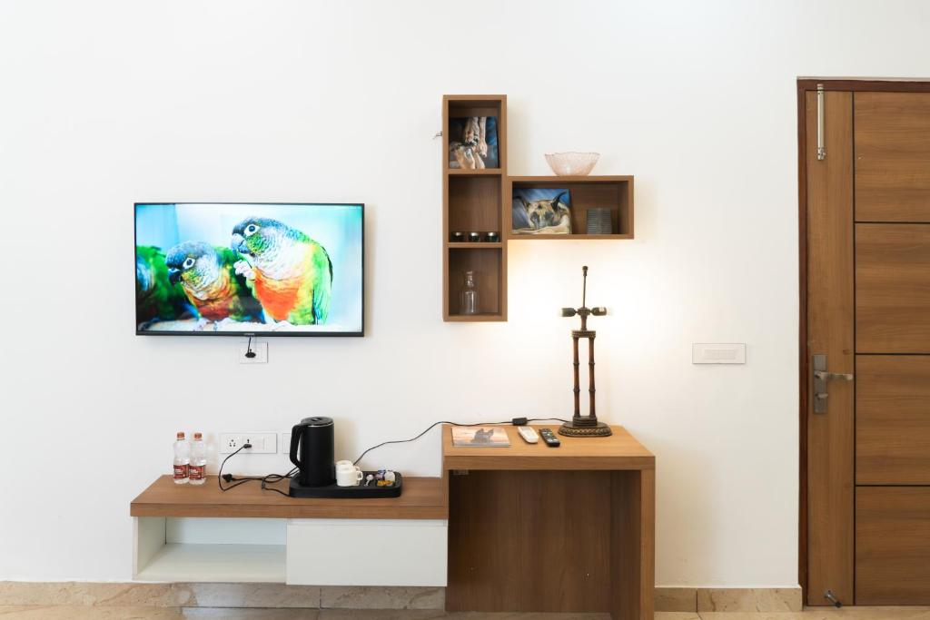 TV a/nebo společenská místnost v ubytování Sandane Homes