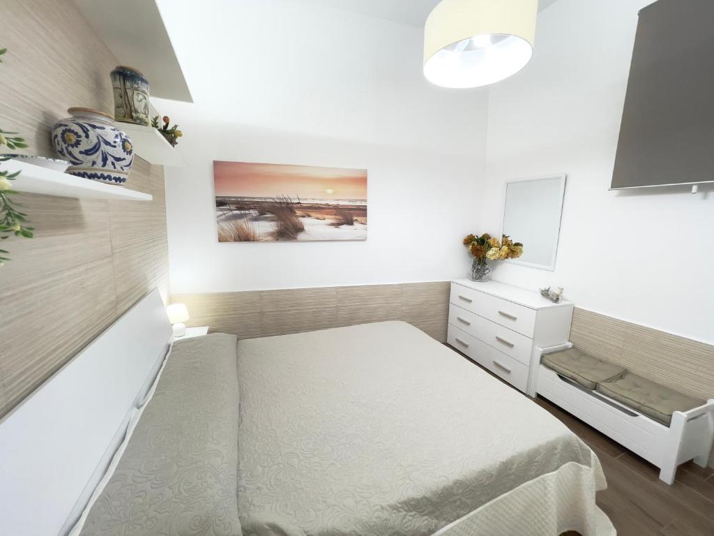 A bed or beds in a room at CATHEDRAL APARTMENT