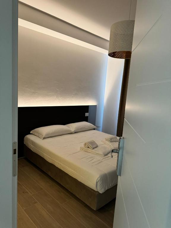 Postel nebo postele na pokoji v ubytování Hotel Airone