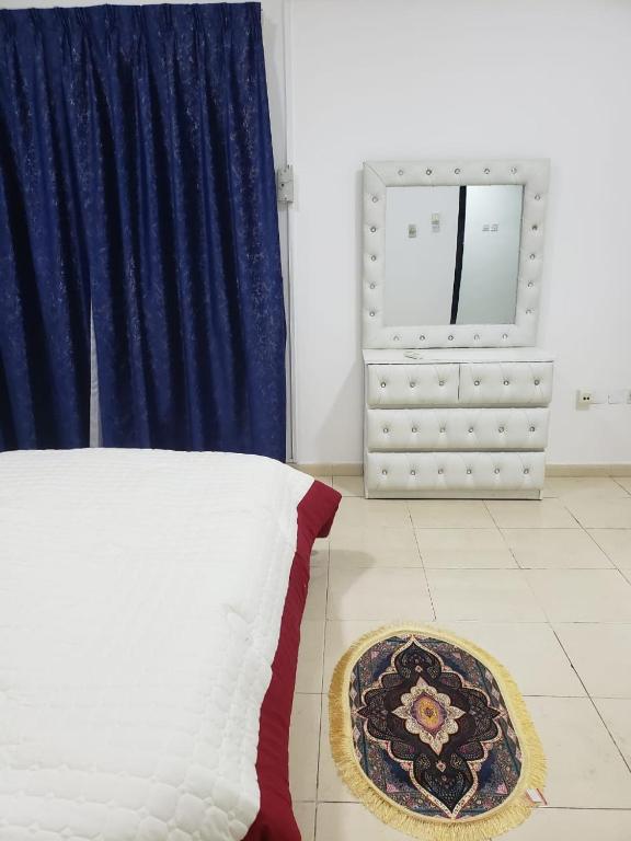 Ένα ή περισσότερα κρεβάτια σε δωμάτιο στο The Welcoming Wing