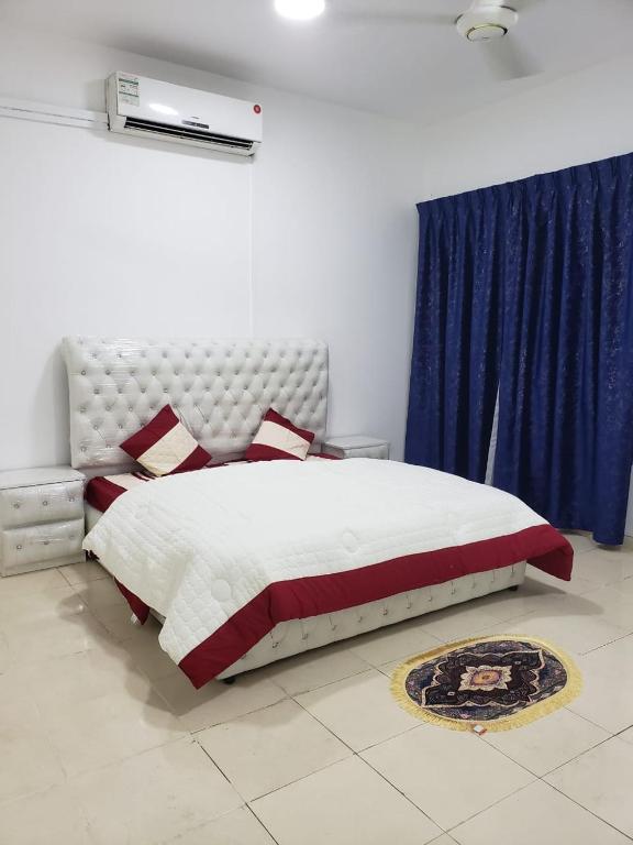 Ένα ή περισσότερα κρεβάτια σε δωμάτιο στο The Welcoming Wing