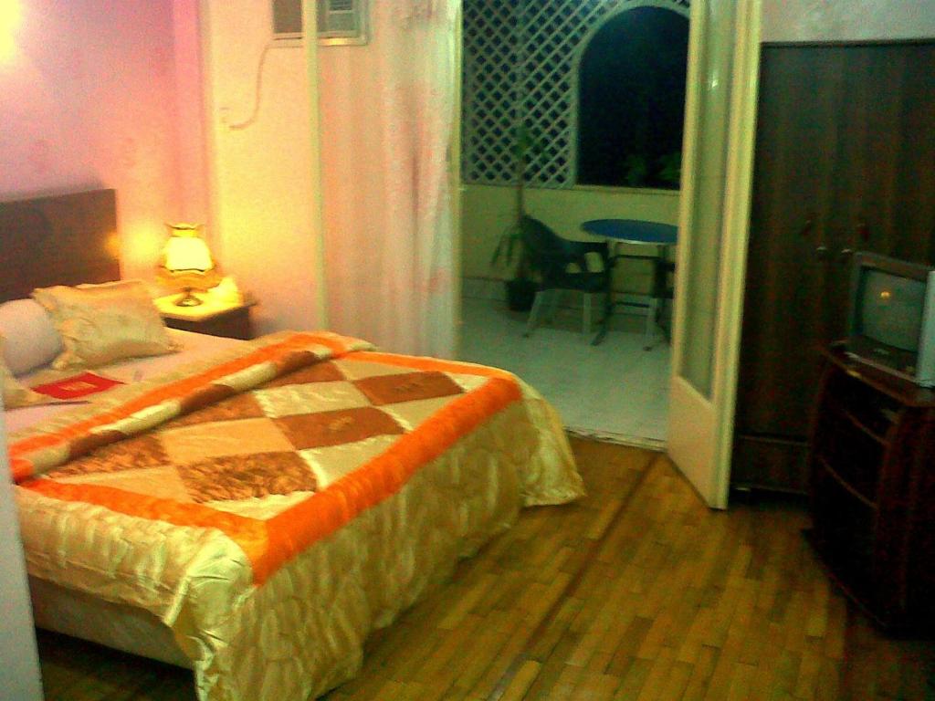 Postel nebo postele na pokoji v ubytování Cairo Moon Hostel