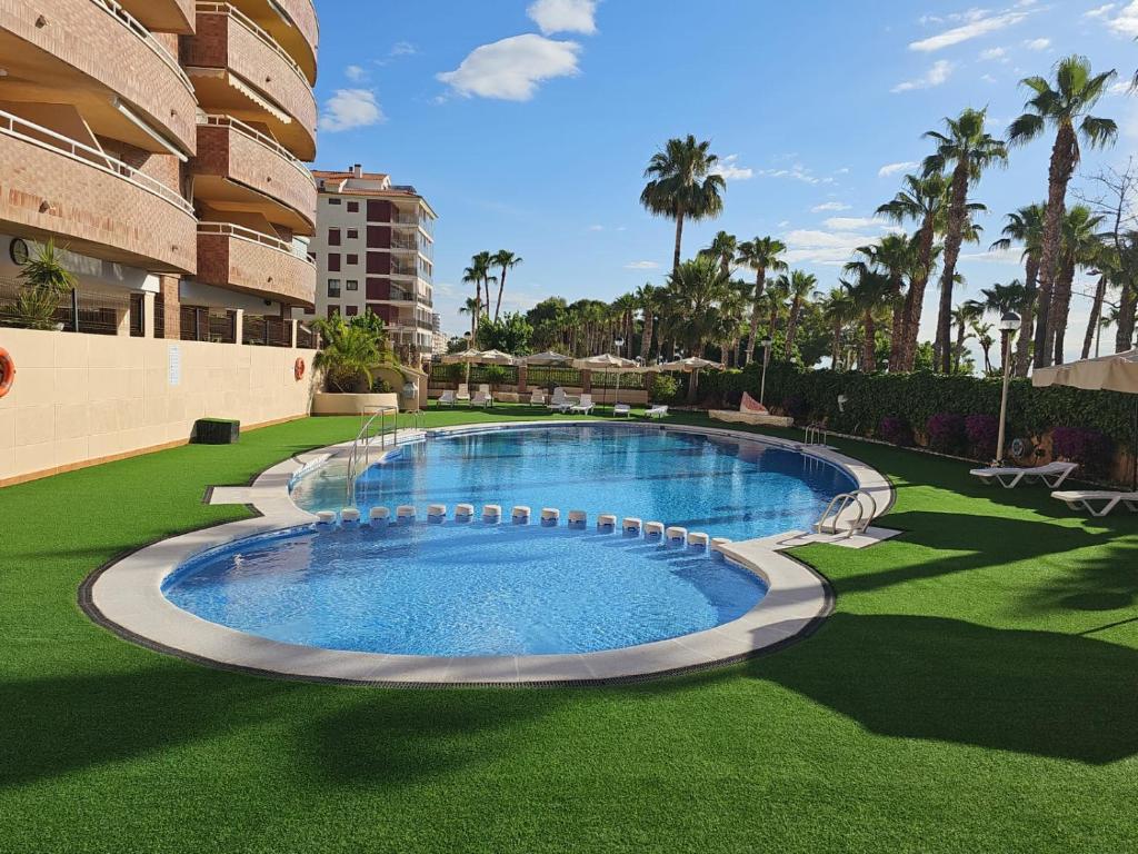 Bazén v ubytování Apartamento Acapulco III Primera linea nebo v jeho okolí