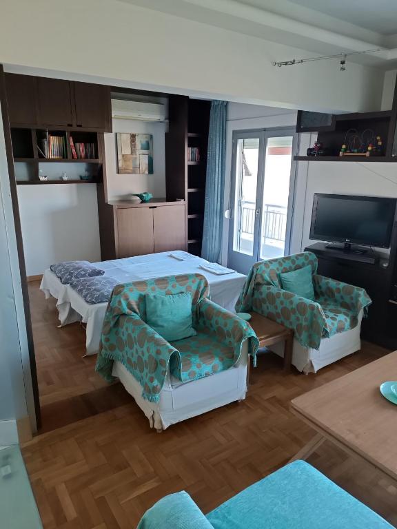 A kitchen or kitchenette at Lilioum Apartment