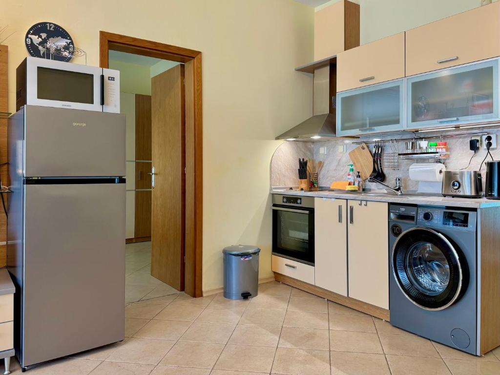 A kitchen or kitchenette at Premium Apartment Midia Beach