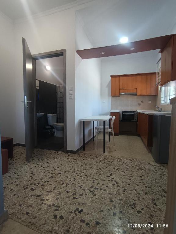 A kitchen or kitchenette at RENA APARTMENTS