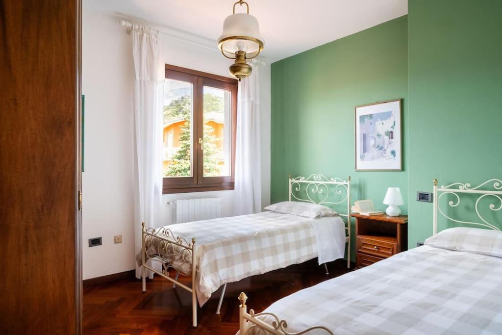Ένα ή περισσότερα κρεβάτια σε δωμάτιο στο Casa in Gallura - Mare, Montagna, Escursioni