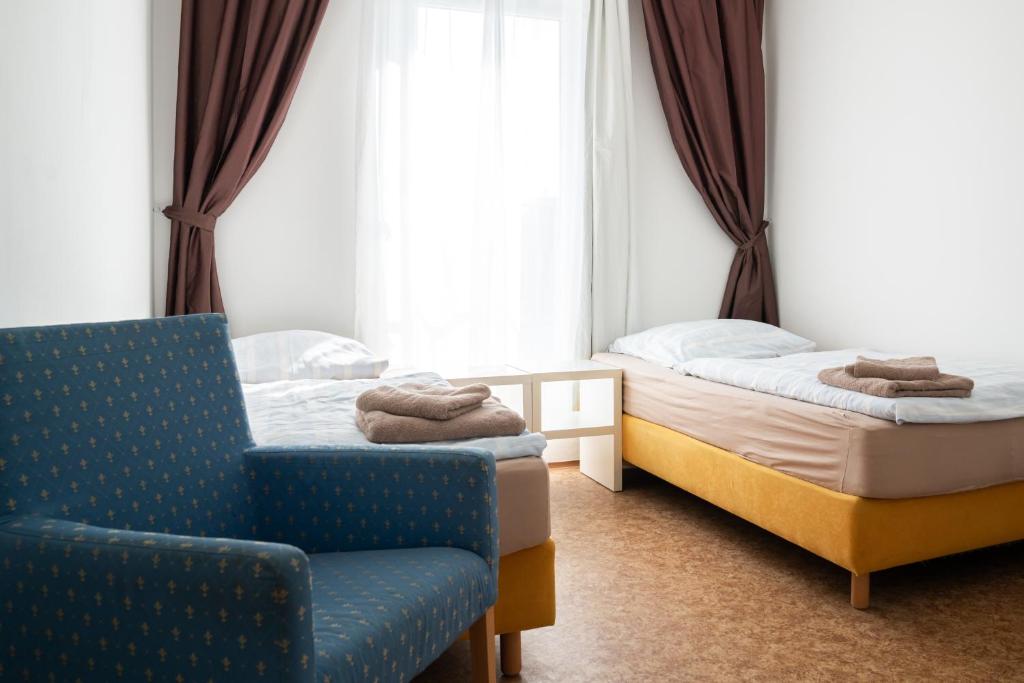 Postel nebo postele na pokoji v ubytování Ubytovna Koněšín