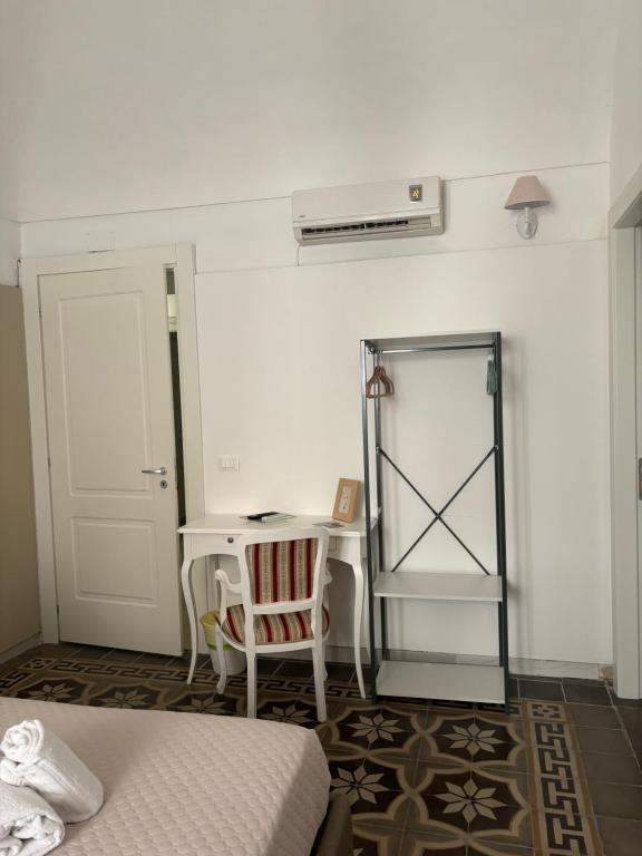 Postel nebo postele na pokoji v ubytování Immacolata Rooms