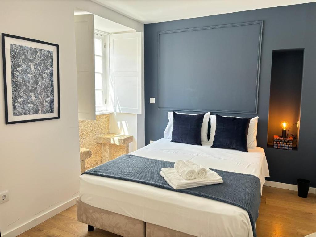 Cama ou camas em um quarto em Casa do Museu