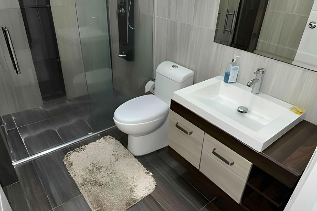 Koupelna v ubytování Rio-ApartaHotel-Centro