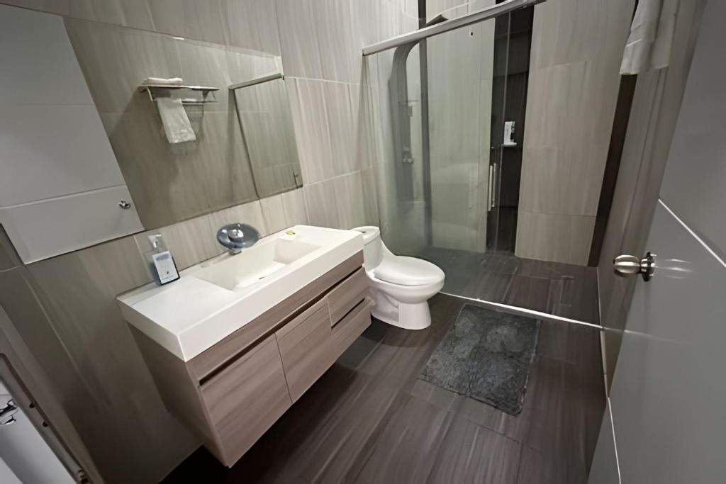 Koupelna v ubytování Rio-ApartaHotel-Centro