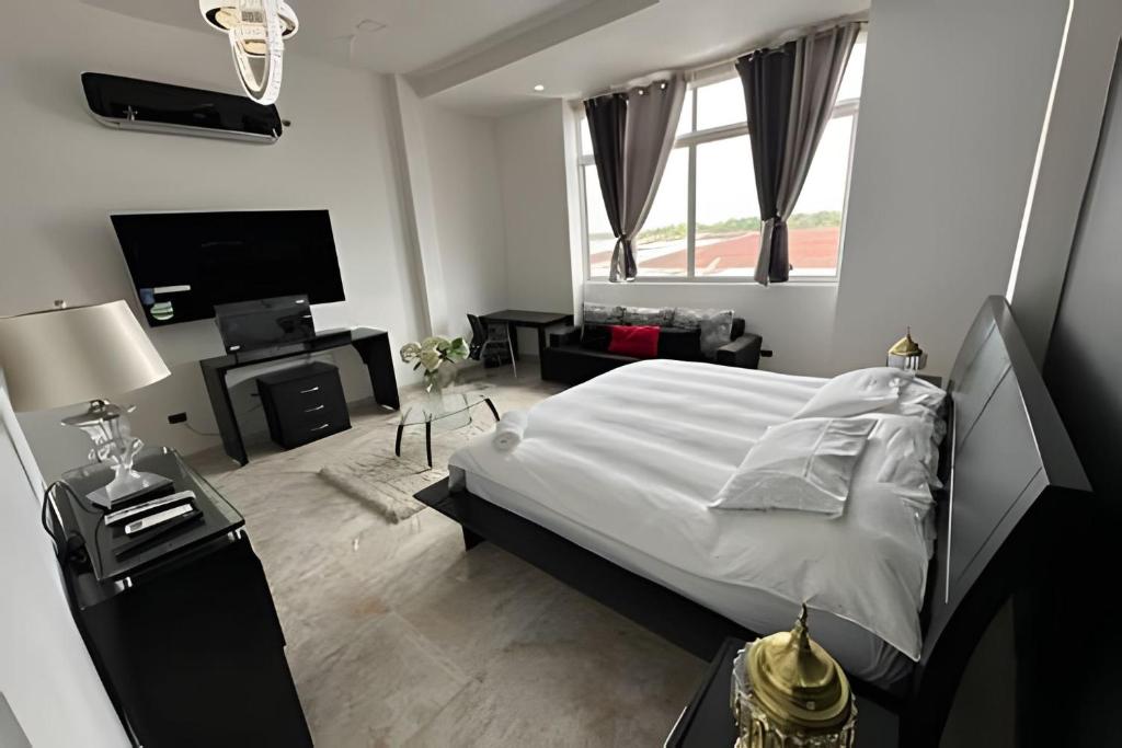 Postel nebo postele na pokoji v ubytování Rio-ApartaHotel-Centro