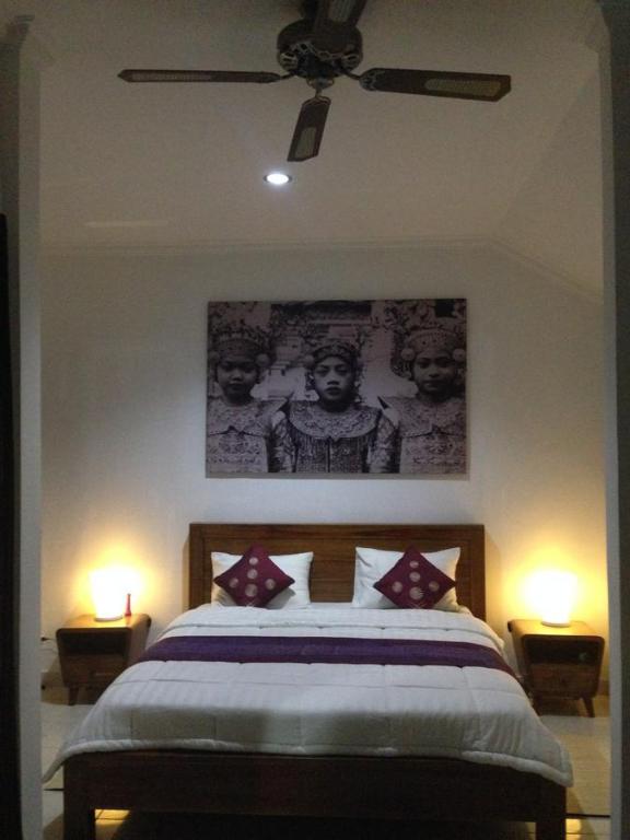 Postel nebo postele na pokoji v ubytování Ubud Rooms B&B