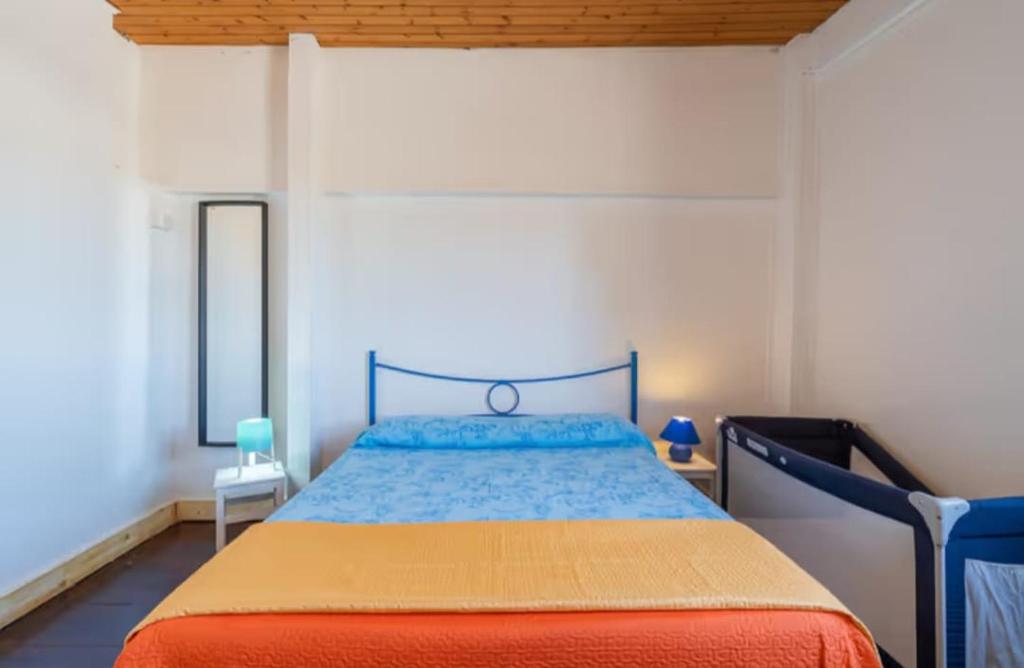 Кровать или кровати в номере Villa con piscina al mare