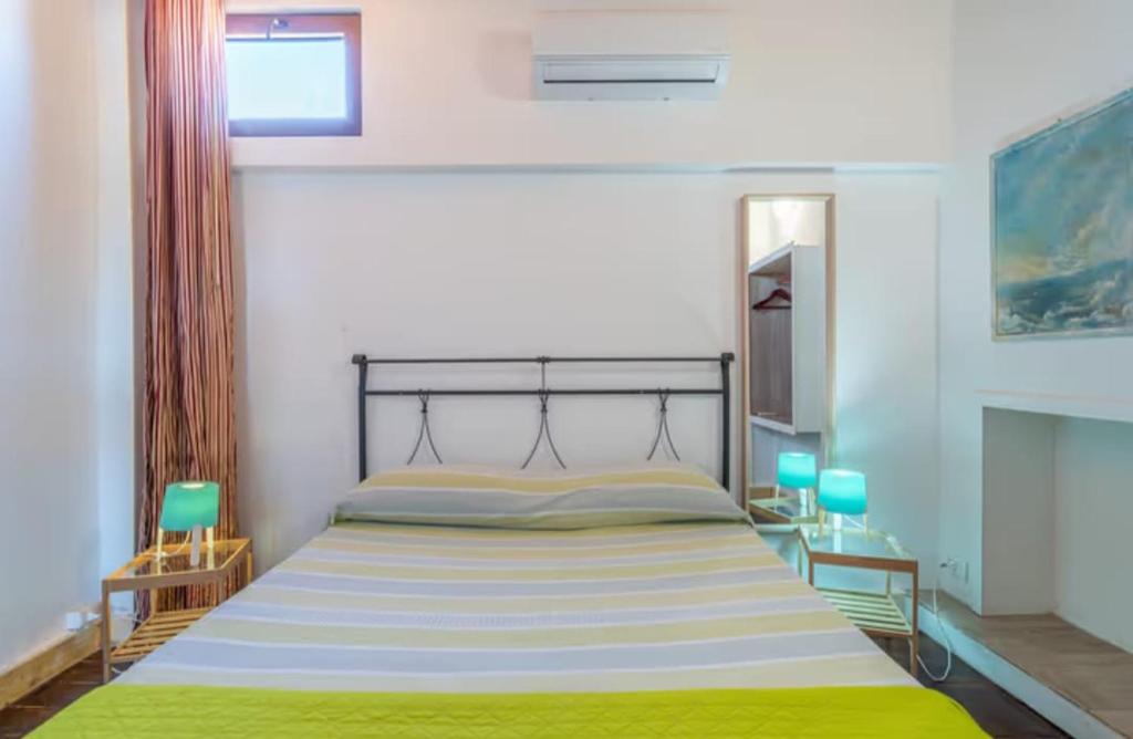 Кровать или кровати в номере Villa con piscina al mare