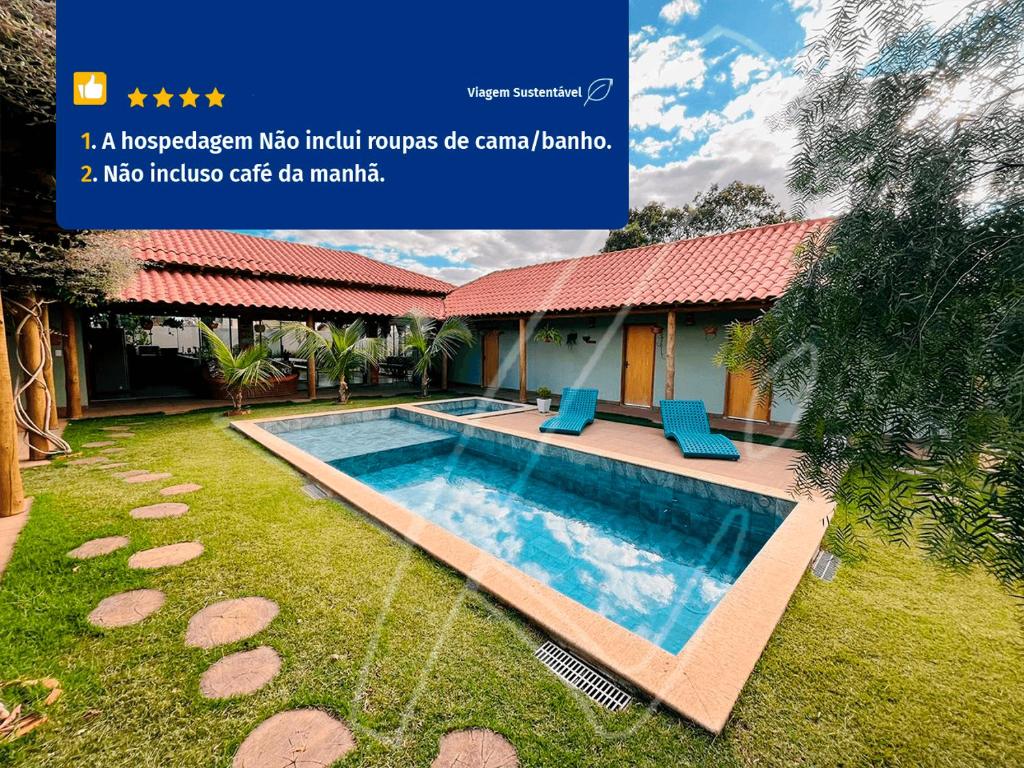 eine Zeitschriftenwerbung für ein Haus mit Pool in der Unterkunft Recanto dos Sonhos - Rio Quente - Goiás in Rio Quente