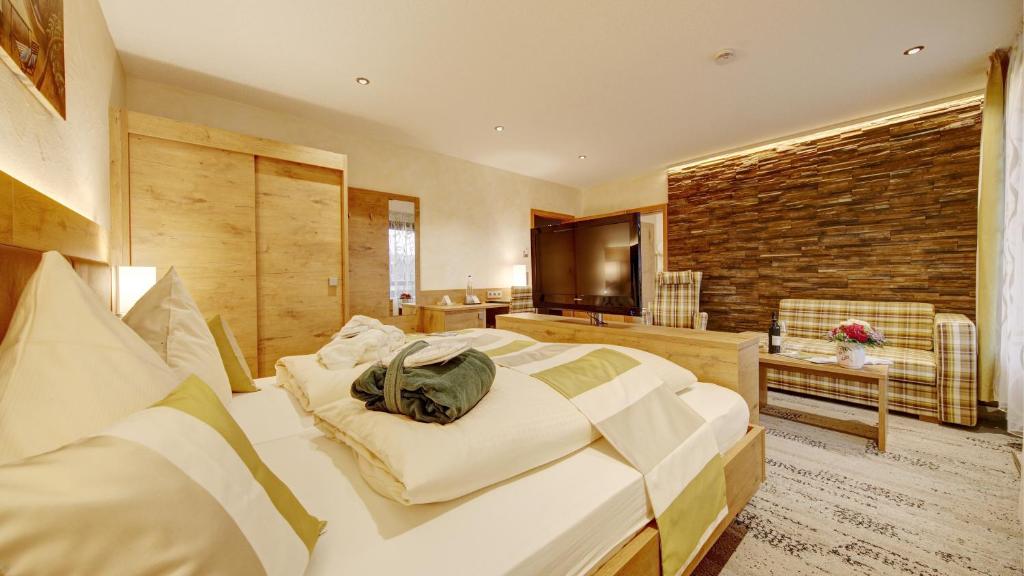 Postel nebo postele na pokoji v ubytování Wellness-Hotel Talblick