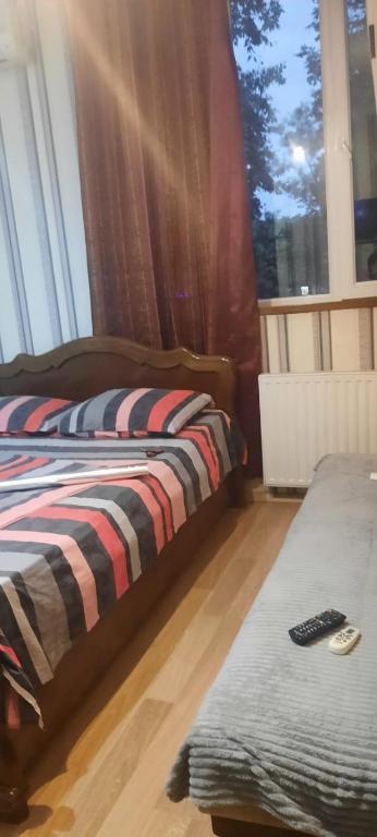 Postel nebo postele na pokoji v ubytování Guesthouse Imma in Old Tbilisi