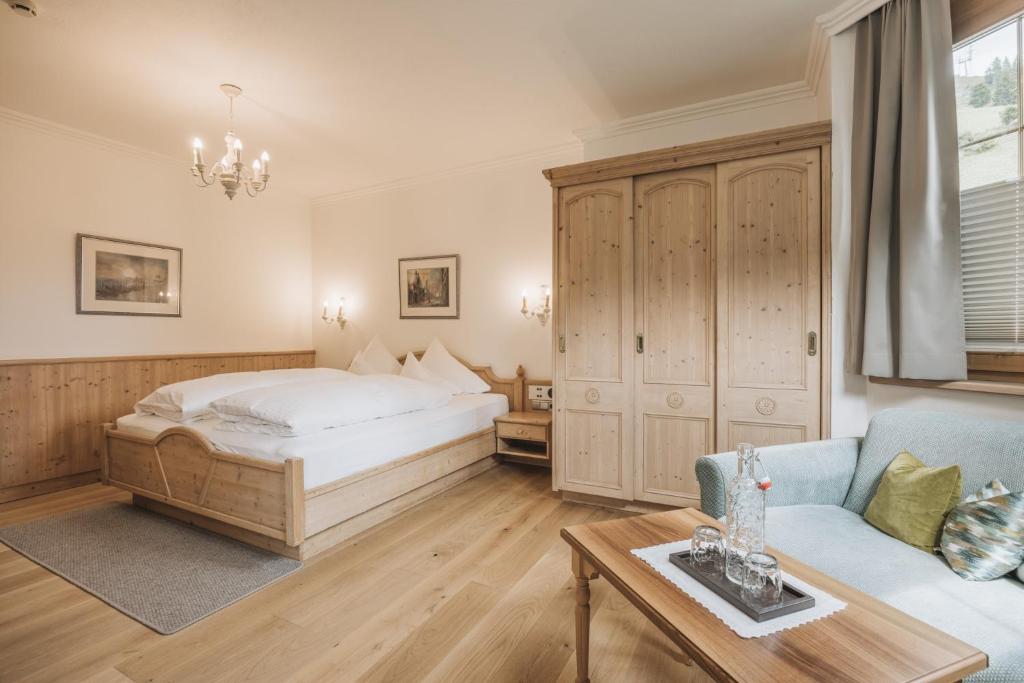 Postel nebo postele na pokoji v ubytování Hotel Gaspingerhof
