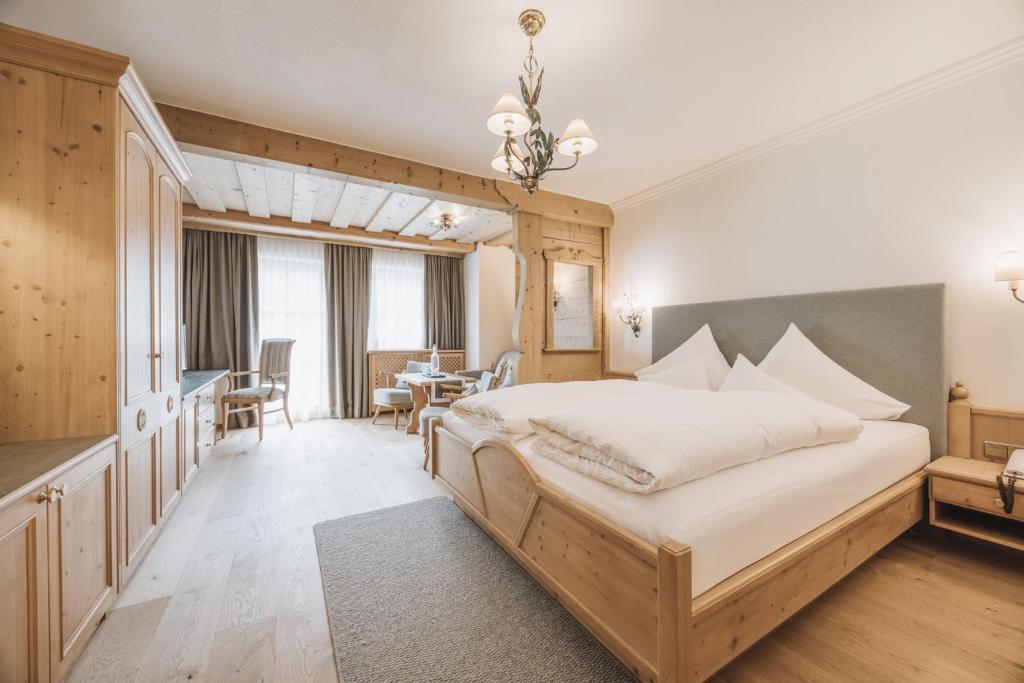 Postel nebo postele na pokoji v ubytování Hotel Gaspingerhof