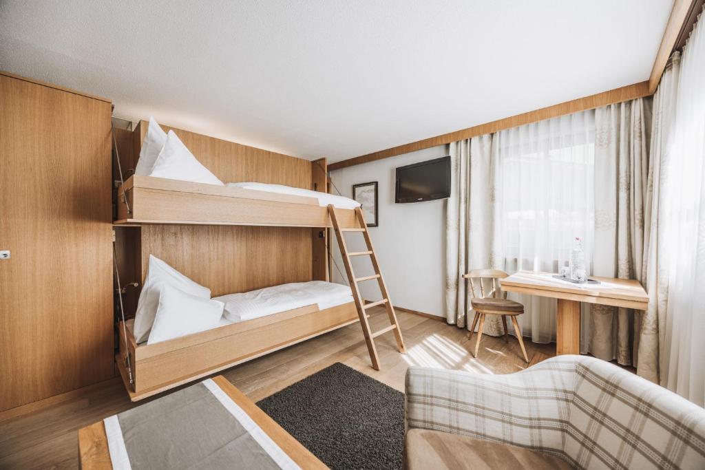 Postel nebo postele na pokoji v ubytování Hotel Gaspingerhof