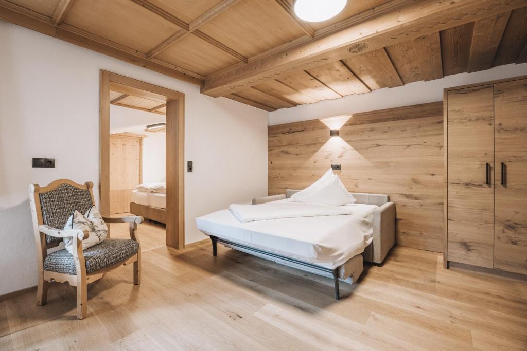 Postel nebo postele na pokoji v ubytování Hotel Gaspingerhof