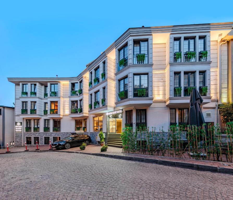 a row of buildings on a cobblestone street at Sultan Hamit Hotel in Istanbul