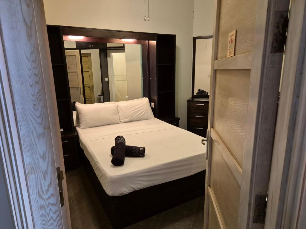 Uma cama ou camas num quarto em Barracuda