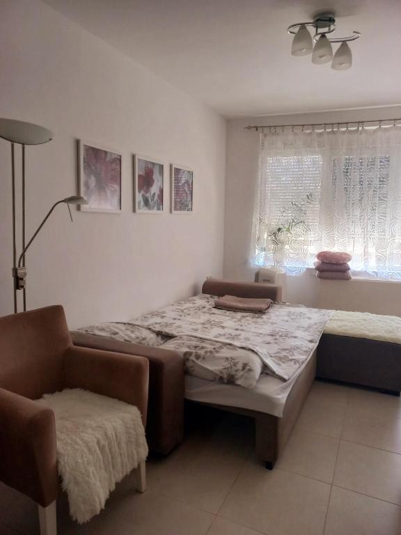 Postel nebo postele na pokoji v ubytování Anastasija Lux 3