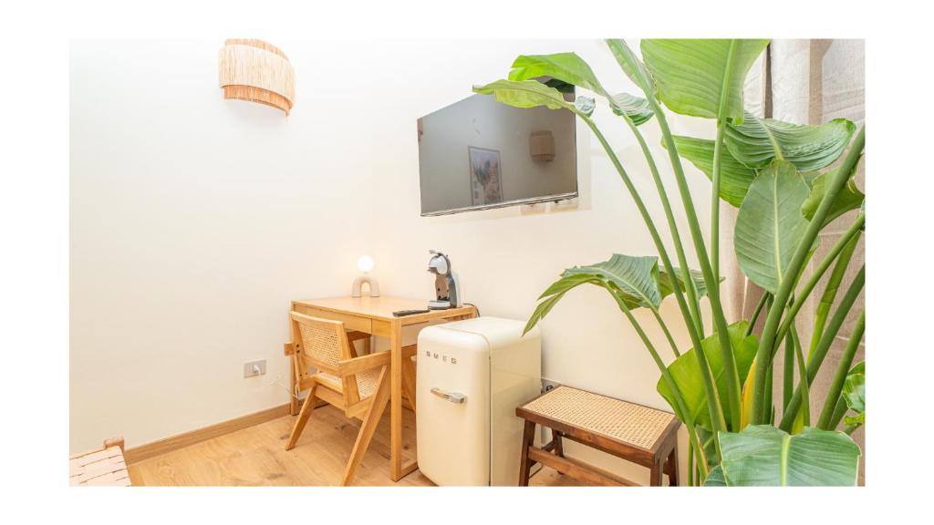 TV a/nebo společenská místnost v ubytování Green Guest House Alghero