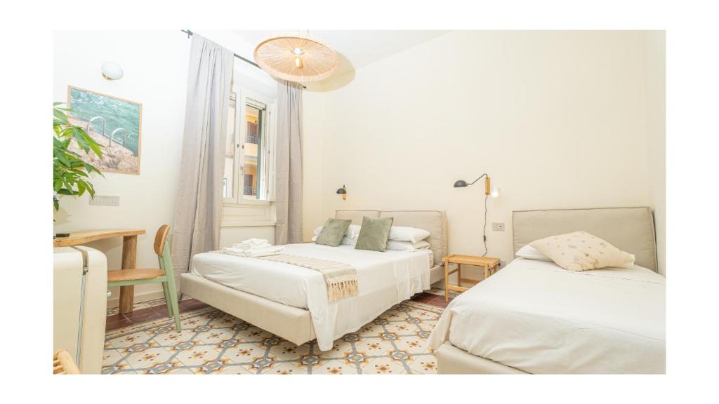 Postel nebo postele na pokoji v ubytování Green Guest House Alghero