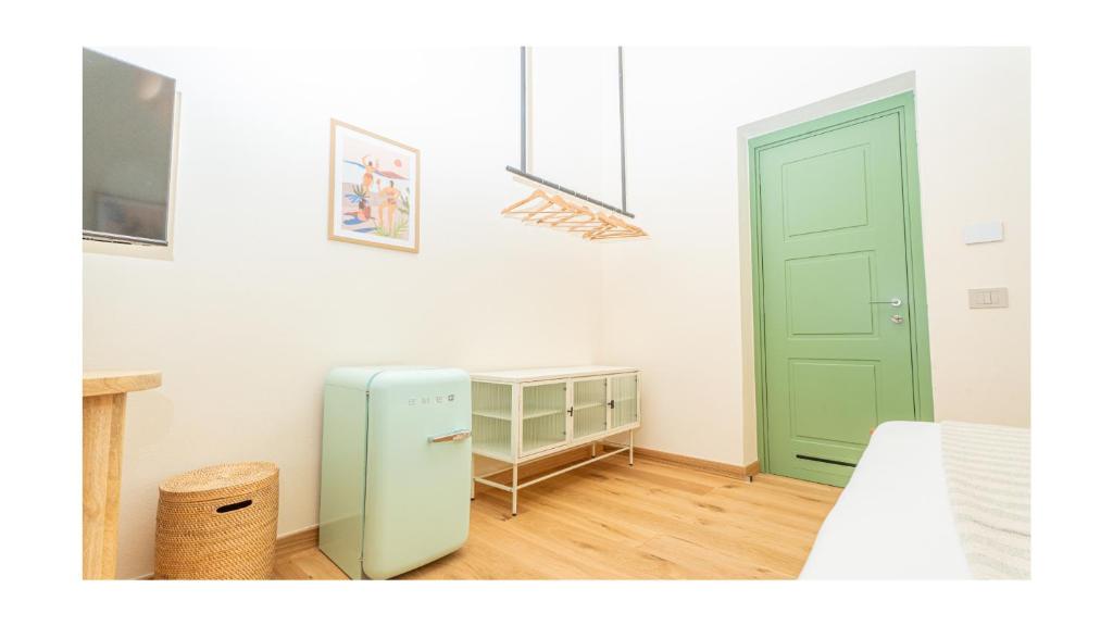 Postel nebo postele na pokoji v ubytování Green Guest House Alghero