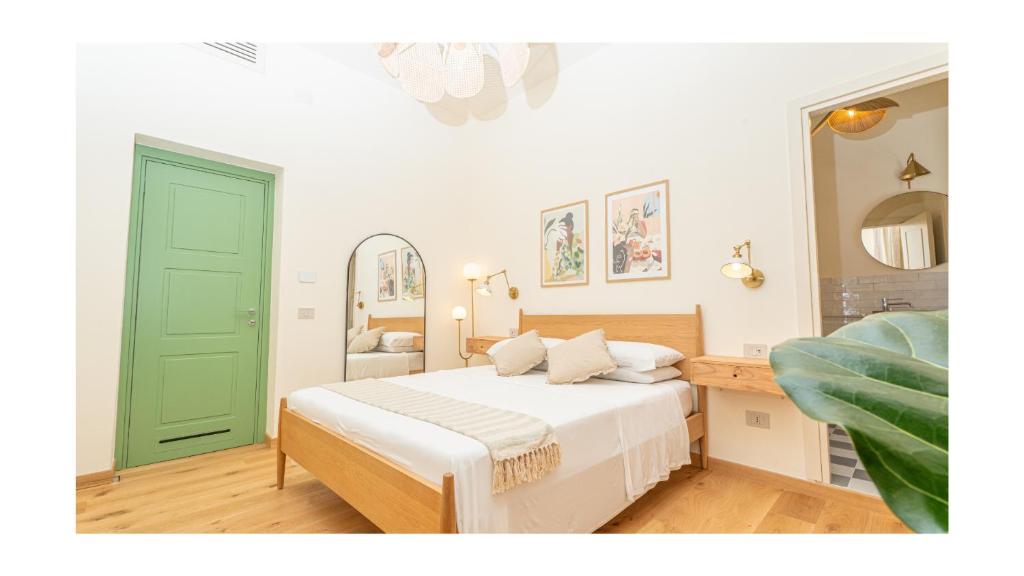 Postel nebo postele na pokoji v ubytování Green Guest House Alghero
