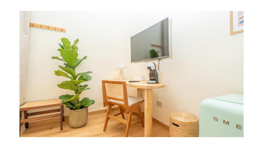 TV a/nebo společenská místnost v ubytování Green Guest House Alghero