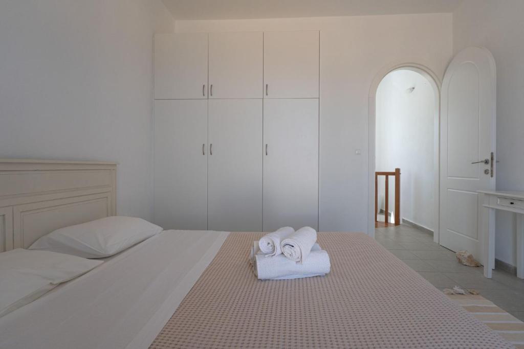 Postel nebo postele na pokoji v ubytování Maisonette San Tosa
