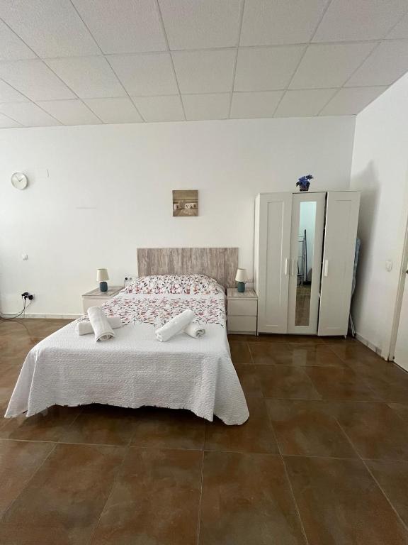 A bed or beds in a room at Bécquer 3