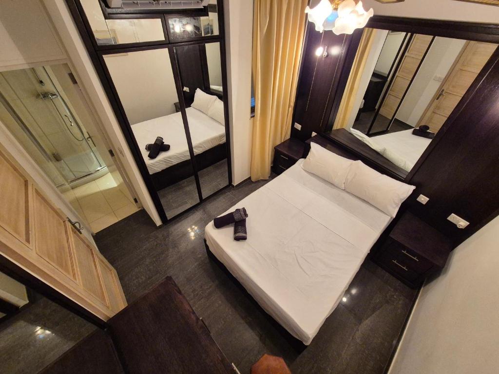 Uma cama ou camas num quarto em Barracuda