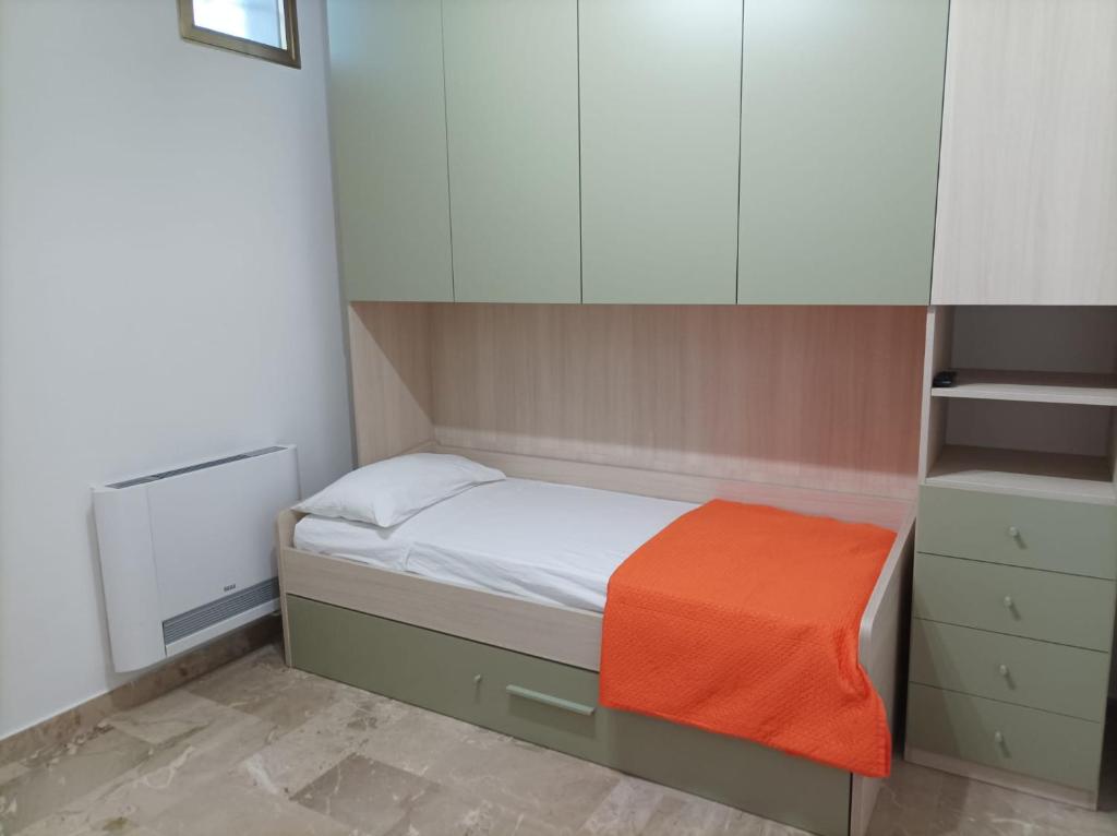 Postel nebo postele na pokoji v ubytování A casa di Elena e Francesco