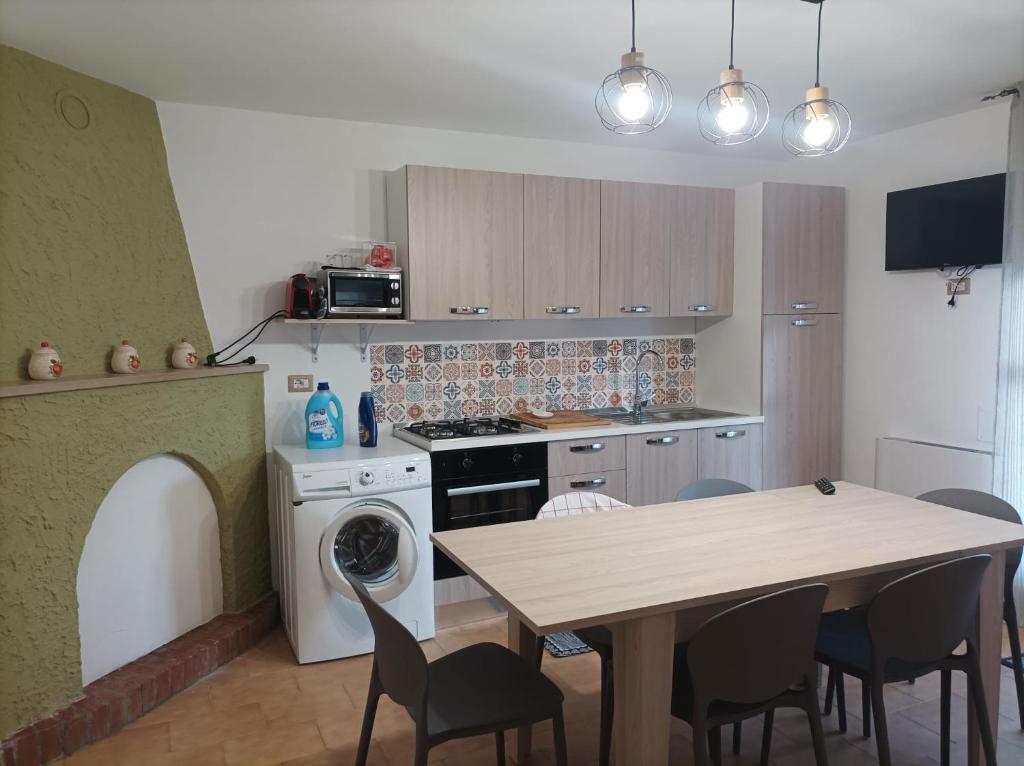 Kuchyň nebo kuchyňský kout v ubytování A casa di Elena e Francesco