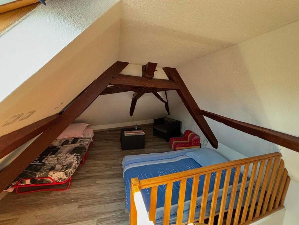 Postel nebo postele na pokoji v ubytování Chic et relax version chambre en mezzanine de 7 places