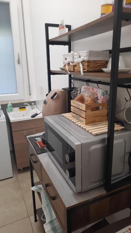 Kuchyň nebo kuchyňský kout v ubytování Efebo Rooms