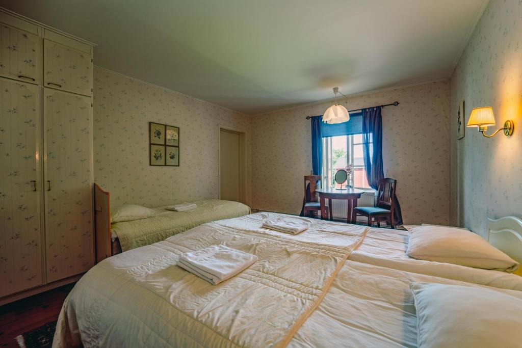 Säng eller sängar i ett rum på Svaneholm Hotel