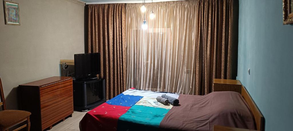 Postel nebo postele na pokoji v ubytování Asine Yerevan