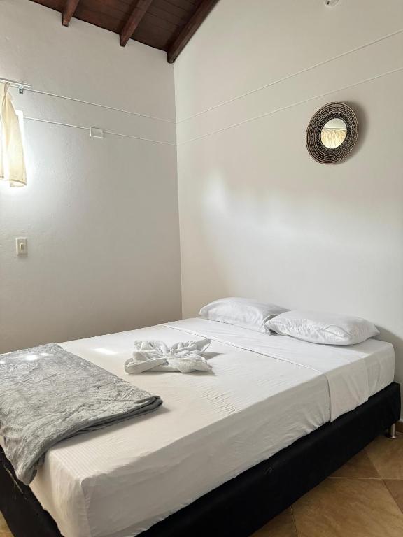 Postel nebo postele na pokoji v ubytování Vila Serena