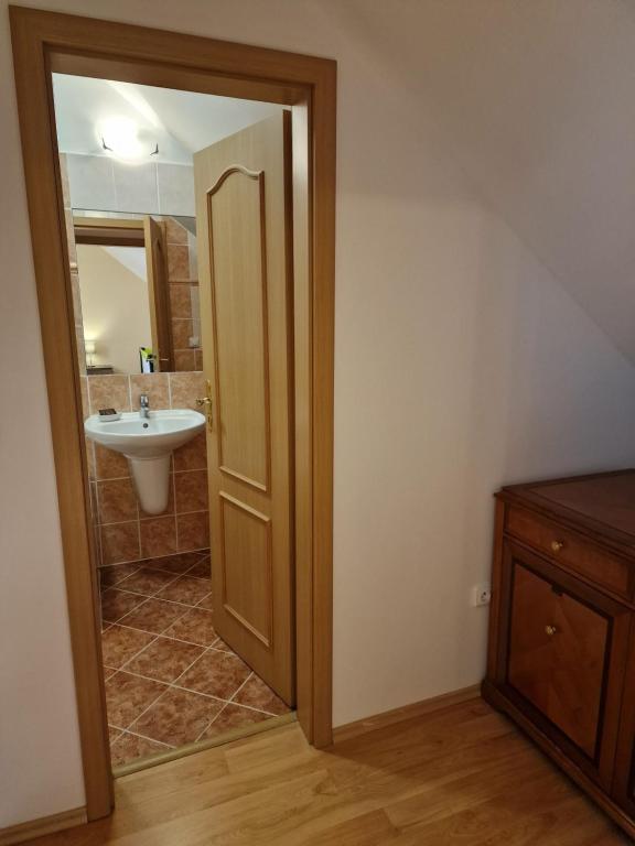 Koupelna v ubytování Hotel Opat