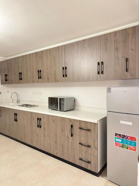 Kuchyň nebo kuchyňský kout v ubytování ليفينق ان 2 living Inn